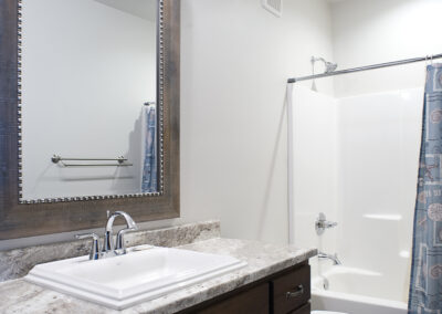Bayside Condos bathroom design - multifamily residential architecture, Arnold's Park