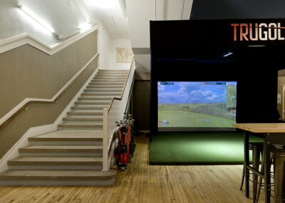 Hatch Montgomery Ward golf simulator - adaptive reuse architecture, Iowa